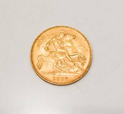 Lot 243 - A George V half gold sovereign dated 1913.