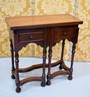 Lot 199 - An 19th century oak tea / card table, the top...