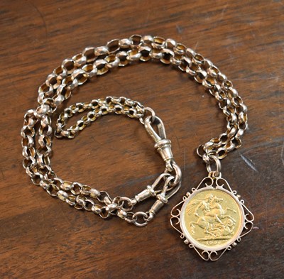 Lot 239 - A 9ct gold watch chain with a 1902 half...