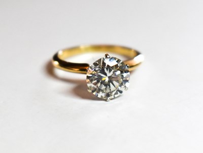 Lot 80 - A 14ct gold, and diamond solitaire ring, the...
