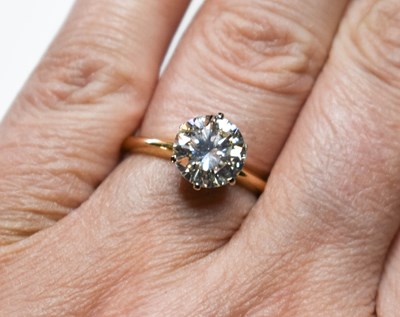 Lot 80 - A 14ct gold, and diamond solitaire ring, the...