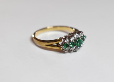 Lot 59 - A 9ct gold emerald and diamond ring, the five...