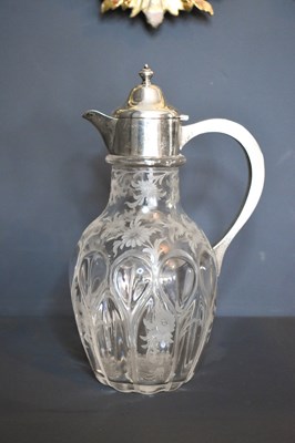 Lot 288 - A silver and cut glass claret jug, the heavy...