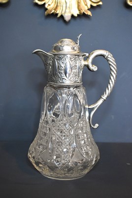 Lot 289 - A silver and cut glass claret jug, with rope...