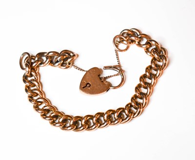 Lot 142 - A 9ct gold curb link charm bracelet with heart...
