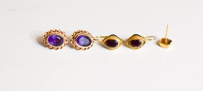 Lot 167 - A pair of 9ct gold and garnet earrings of...