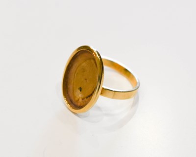 Lot 108 - An 18ct gold ring, the large oval mount...