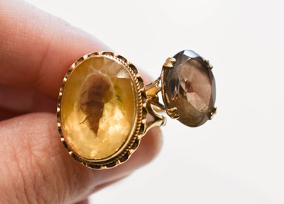 Lot 9 - A 9ct gold ring set with an oval cut citrine,...