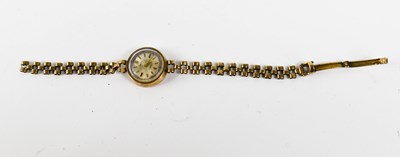 Lot 262 - A 9ct gold lady's, Smiths, wristwatch, the...