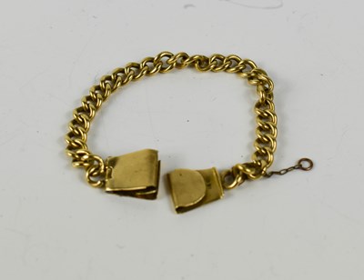 Lot 143 - An 18ct gold curb link chain, with two clip...