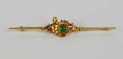 Lot 166 - A Chinese gold and jade brooch, modelled as a...