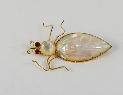 Lot 195 - An 18ct gold, ruby and mother of pearl bug...