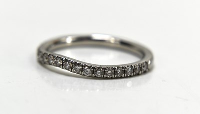 Lot 1 - A platinum and diamond double halo ring, the...