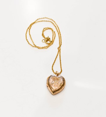 Lot 120 - A 9ct gold, Art Deco heart shaped locket, with...