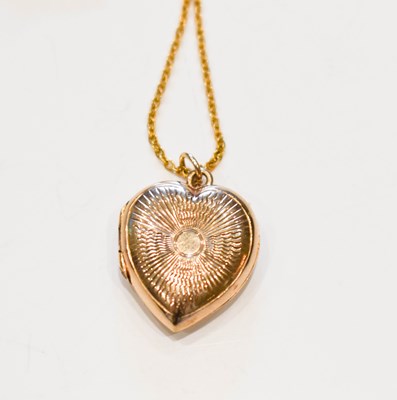 Lot 120 - A 9ct gold, Art Deco heart shaped locket, with...