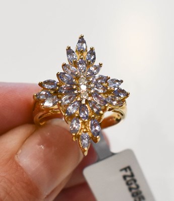 Lot 118 - A 9ct gold, tanzanite and diamond dress ring,...