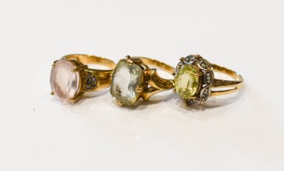 Lot 46 - A group of three 9ct gold dress rings,...