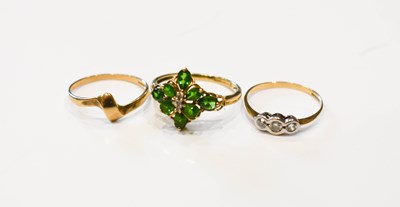 Lot 96 - A group of three 9ct gold dress rings...