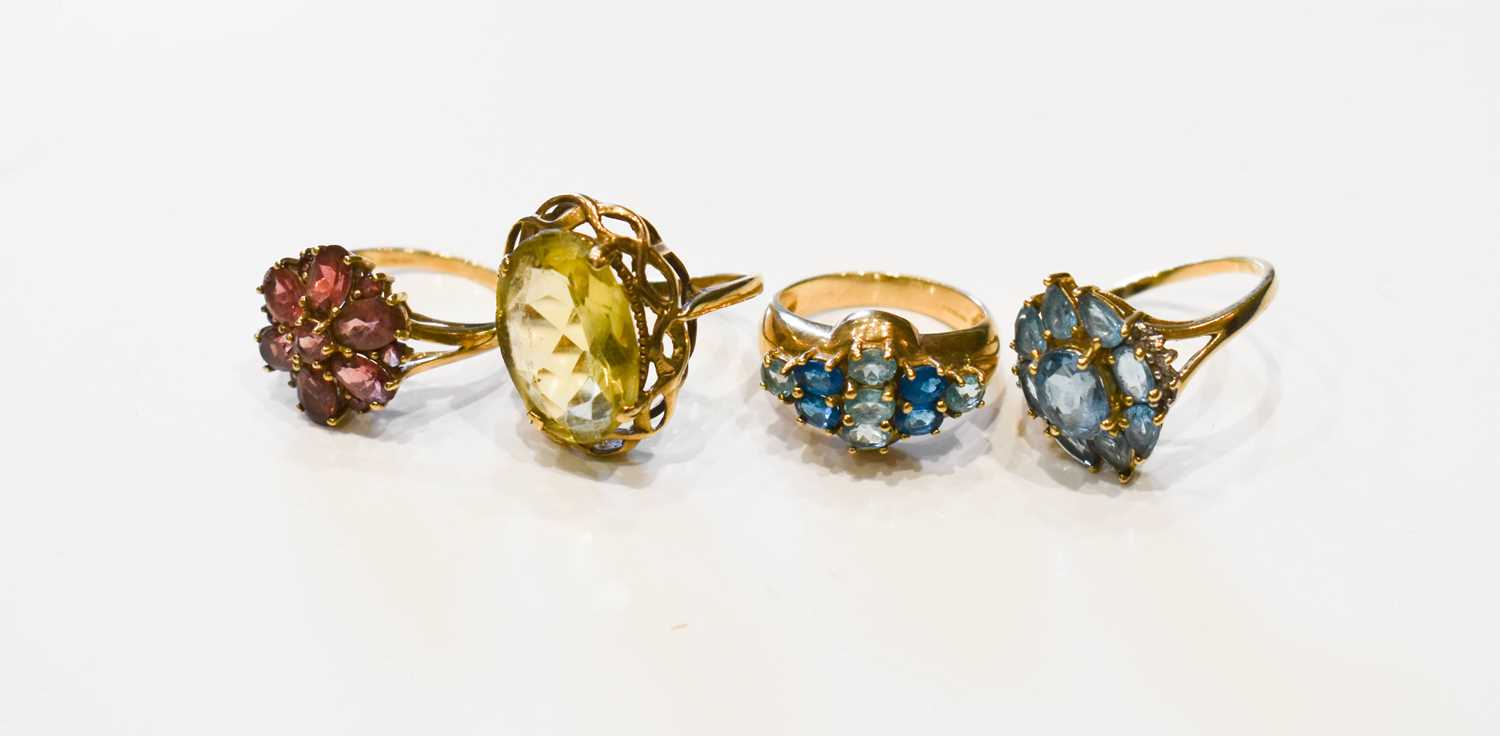 Lot 51 - A group of four 9ct gold dress rings,...