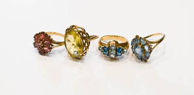 Lot 51 - A group of four 9ct gold dress rings,...
