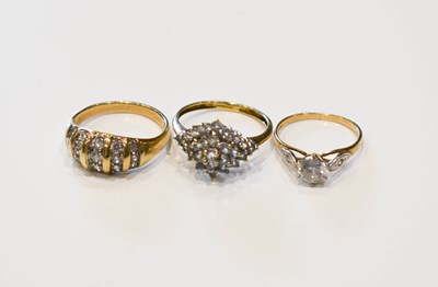 Lot 35 - A group of three 9ct gold and white stone...