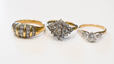 Lot 35 - A group of three 9ct gold and white stone...