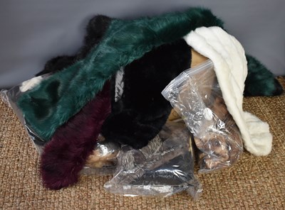 Lot 310 - A large quantity of fur pelts, faux fur shawls...