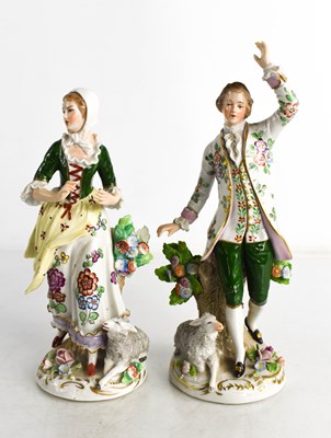 Lot 149 - A pair of Sitzendorf figures of a shepherd and...