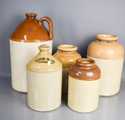 Lot 19 - A group of stoneware jars and flagons to...