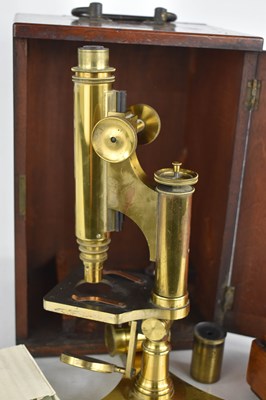 Lot 4 - An R&J Beck brass monocular microscope in...