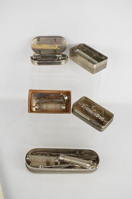 Lot 16 - A group of early 20th century hypodermic...