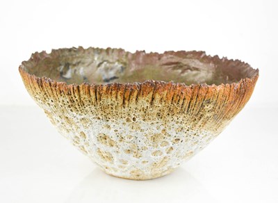Lot 135 - A Studio pottery bowl, with volcanic glaze,...