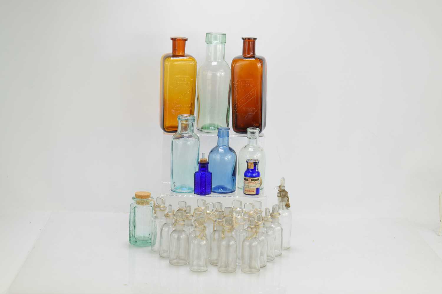 Lot 17 - A group of medicine and other bottles to...
