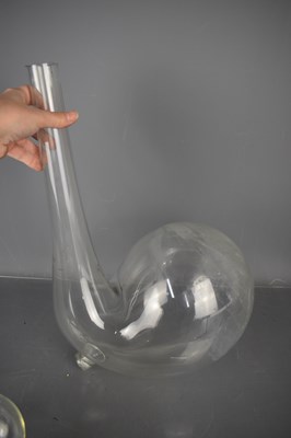 Lot 18 - A large antique chemistry glass retort flask...
