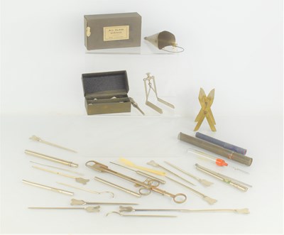 Lot 38 - A group of medical and surgical instruments to...