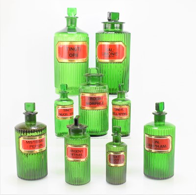 Lot 3 - A group of nine antique green glass apothecary...