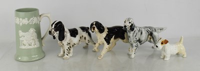 Lot 113 - A group of four Royal Doulton Beswick dogs...