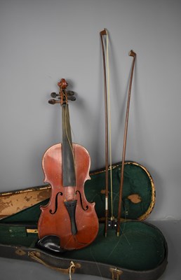 Lot 92 - A 19th century violin with two piece back...