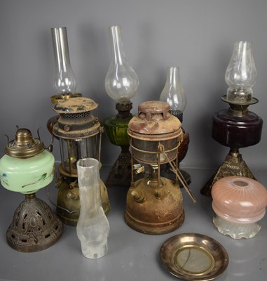 Lot 83 - A group of Victorian oil lamps some with...