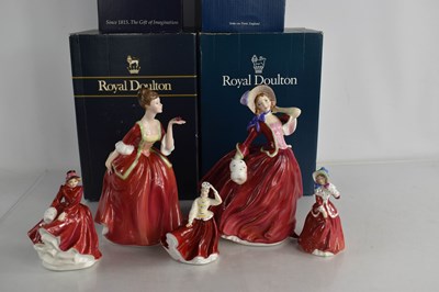 Lot 120 - A group of Royal Doulton figurines comprising...