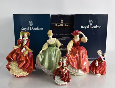 Lot 121 - A group of Royal Doulton figurines comprising...