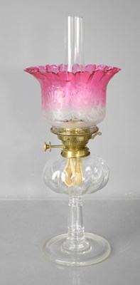 Lot 100 - A 19th century glass oil lamp, the font of...