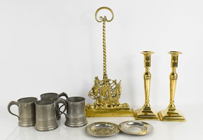 Lot 318 - A collection of pewter and brass comprising a...