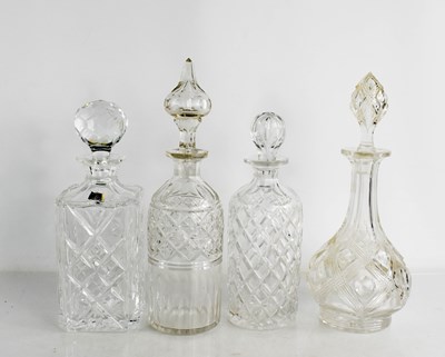 Lot 110 - Four cut glass decanters one by Royal Doulton...