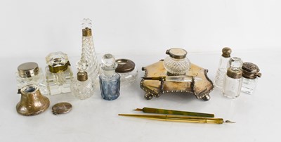 Lot 85 - A group of inkwells including two silver...