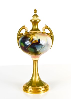 Lot 204 - A Royal Worcester twin handled vase and cover...