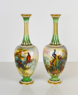 Lot 49 - A pair of Royal Worcester bottle vases,...