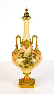 Lot 190 - A Royal Worcester twin handled vase and cover,...