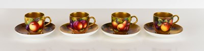 Lot 211 - A set of four Royal Worcester coffee cups and...