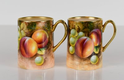 Lot 202 - A pair of Royal Worcester mugs, painted with...